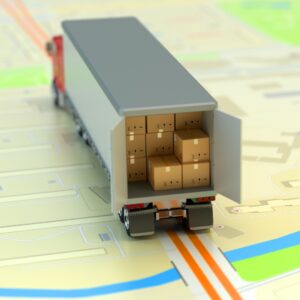 toy car filled with packages sitting on map