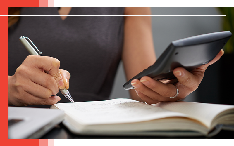 image of a woman looking at her books