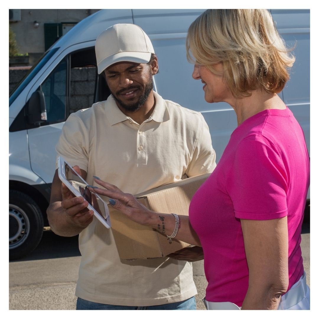 delivery man with happy customer